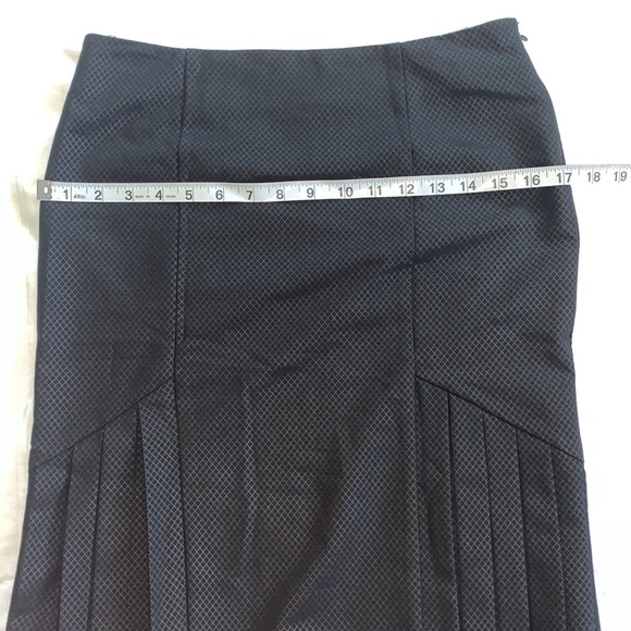 BeBe Skirt, Size 2. Good used condition. Pleaded on the sides. Runs big - Picture 5 of 6